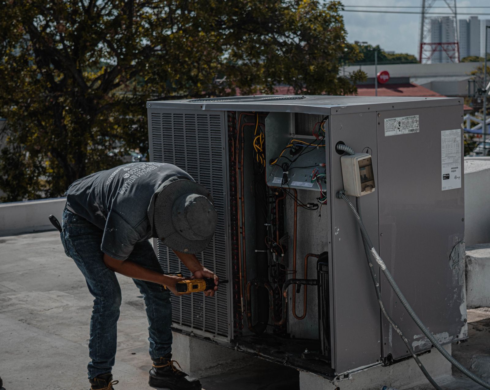 Technician at work on commercial equipment